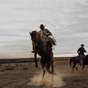 Cowboy Riding A Horse